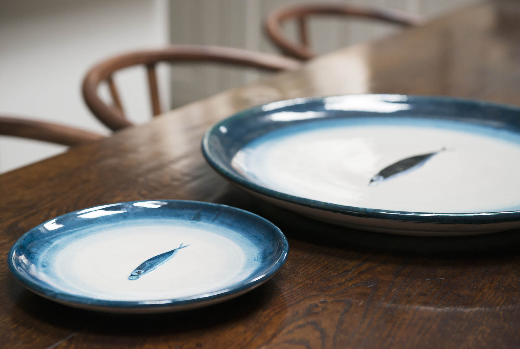 Plates from Rococo interiors's ceramic collection. She bought these ones in person from the artist's studio on her  honeymoon on Italy's Amalfi coast. 