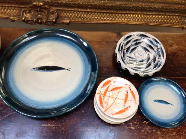 Plates from Rococo interiors's ceramic collection. She bought these ones in person from the artist's studio on her  honeymoon on Italy's Amalfi coast. 