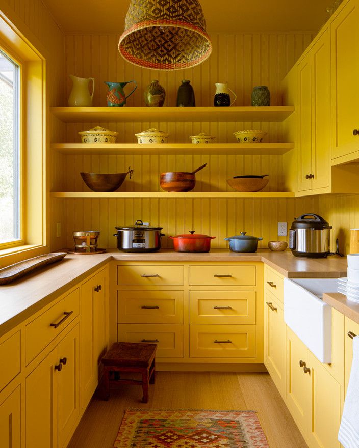 Farrow & Ball's Babouche in this pantry by Susan Deliss